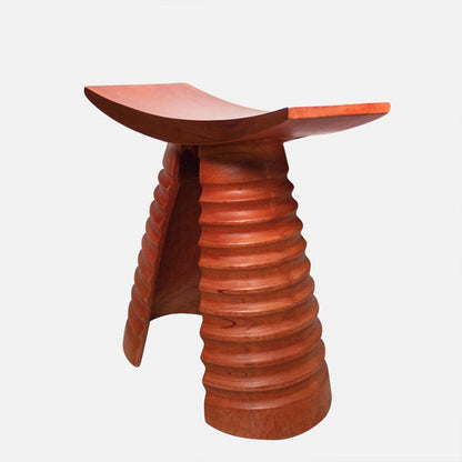 Wooden stool with a unique design on a white background
